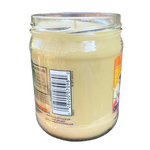 a jar of mayonnaise sitting on top of a table